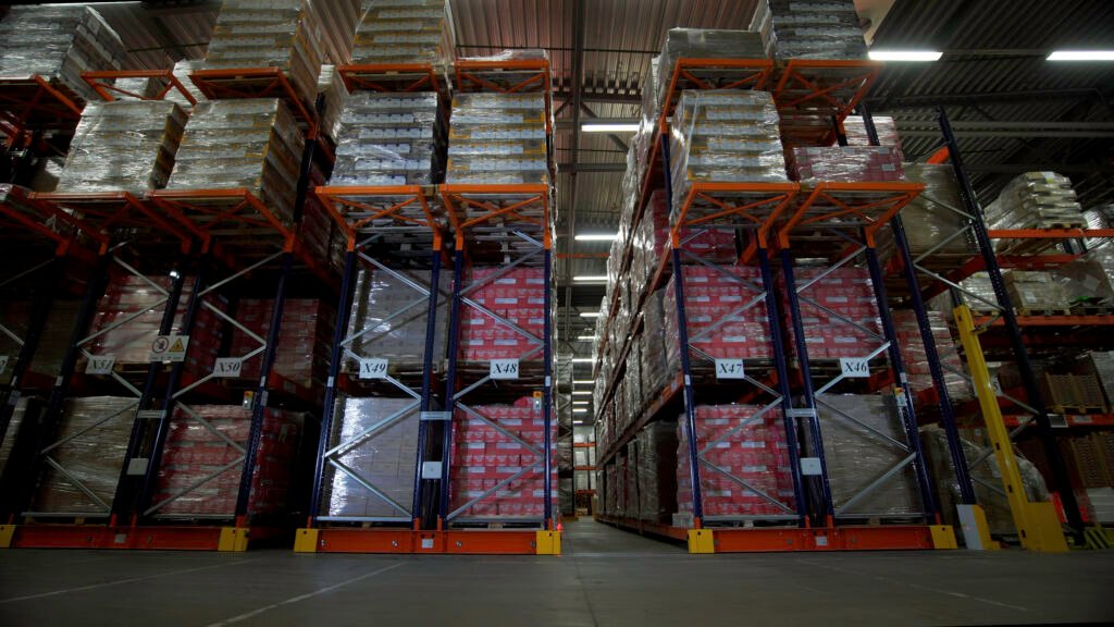 Huge boxes.Creative. Storage of orders in which there are huge boxes very evenly and by numbers on special racks - food distribution companies in Pakistan